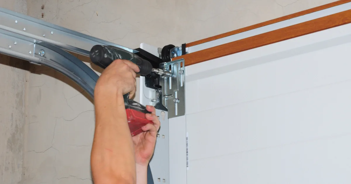 a licensed garage door technician at work